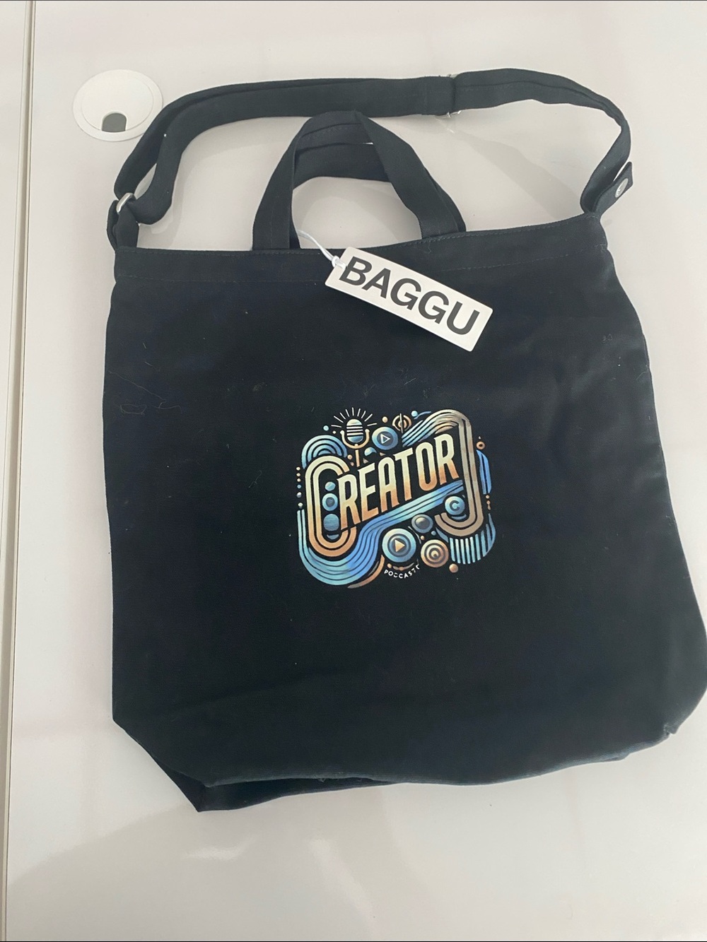 BAGGU Black Canvas Tote with Colorful "Creator" Graphic